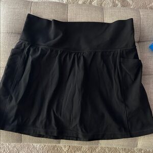 Athleta Black salutation Skort with Stash Pockets size medium